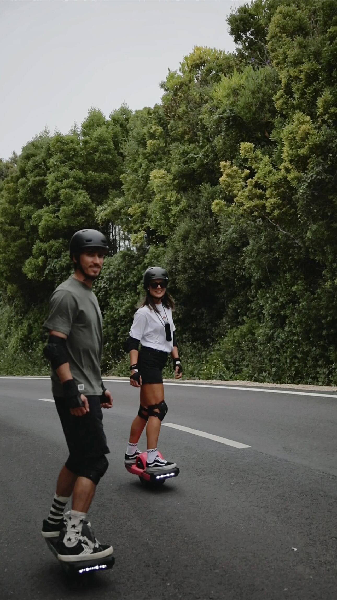 Riding a Onewheel next to a forest